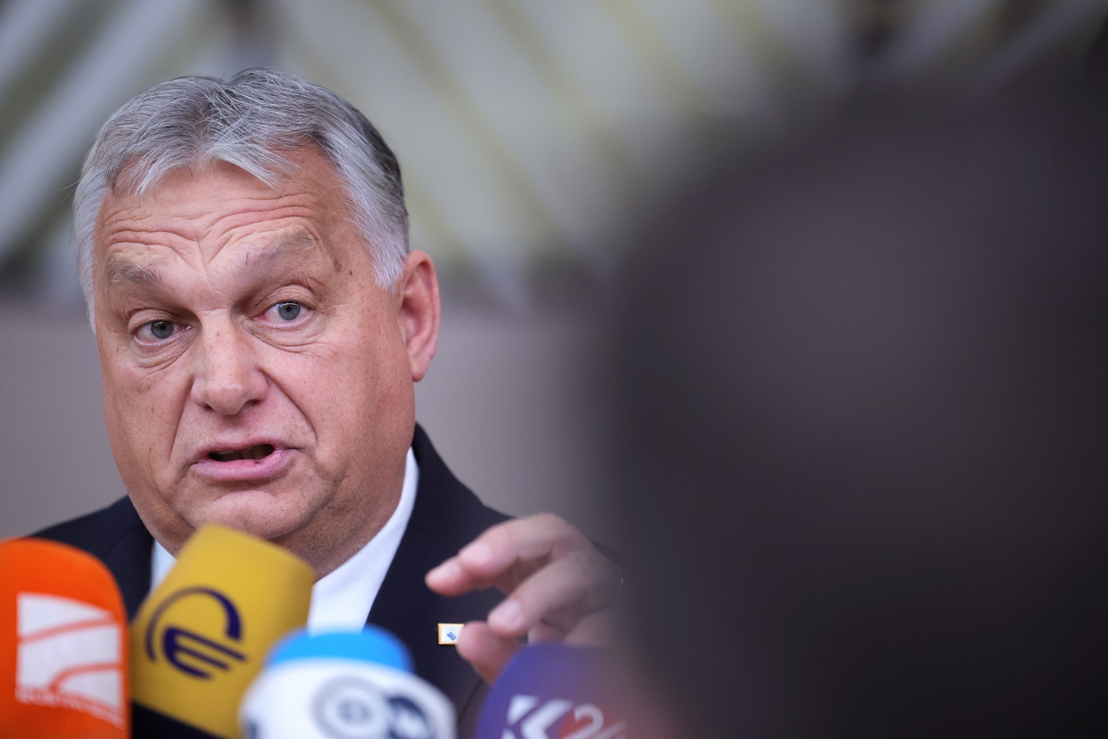 epa10940125 Hungary's Prime Minister Viktor Orban speaks to the media as he arrives for the European Council meeting in Brussels, Belgium, 26 October 2023. In a two-day summit on 26-27 October, EU leaders are expected to address the situation in the Middle-East and Ukraine, as well as the EU's long-term budget, migration, and external relations.  EPA/OLIVIER MATTHYS