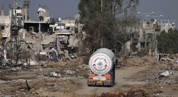 epa11001323 A fuel truck crosses from the southern Gaza Strip into the northern Gaza Strip along Salah Al Din road, in the central Gaza Strip, 29 November 2023. The four-day ceasefire agreed upon by Israel and Hamas was extended by 48 hours on 27 November, followed by more talks about a possible further extension. The Israeli army on 29 November has reissued its daily message to the residents of Gaza to avoid moving back into northern Gaza which is considered a â€œwar zone", to not approach within one kilometer of the border and to not access the sea.  EPA/MOHAMMED SABER