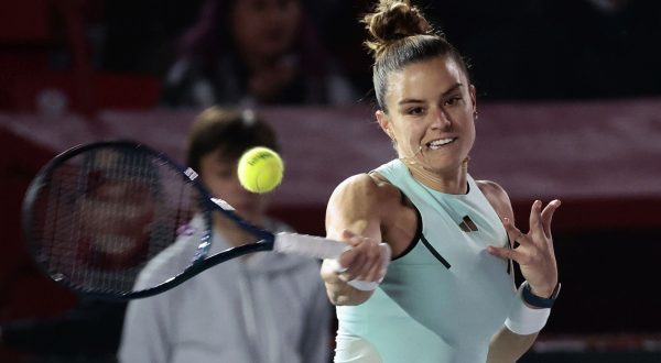 epa11002704 Greek tennis player Maria Sakkari in action against Denmark's Caroline Wozniacki during an exhibition match at the Tennis Fest, held at the Plaza de Toros Mexico in Mexico City, Mexico, 29 November 2023.  EPA/Jose Mendez