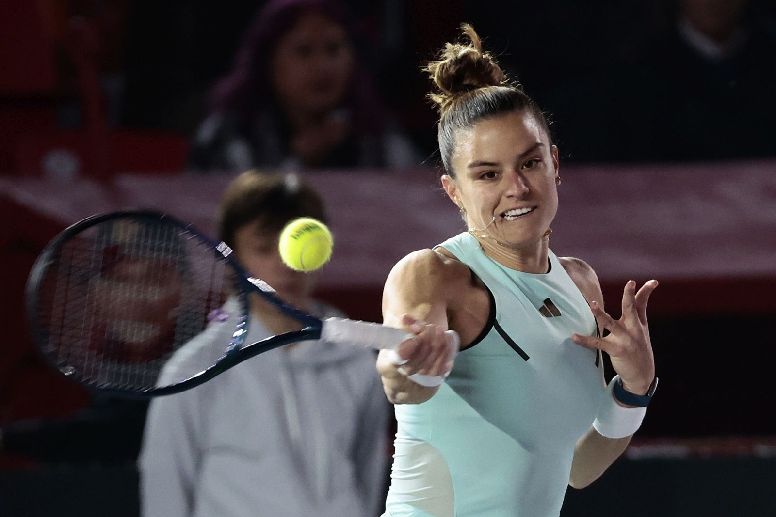 epa11002704 Greek tennis player Maria Sakkari in action against Denmark's Caroline Wozniacki during an exhibition match at the Tennis Fest, held at the Plaza de Toros Mexico in Mexico City, Mexico, 29 November 2023.  EPA/Jose Mendez
