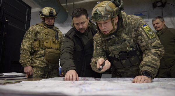 epa11003554 A handout photo made available by the presidential press service shows Ukrainian President Volodymyr Zelensky (C) taking part in a meeting with commanders at the headquarters of the Defense Forces near a frontline close to Kupiansk during his working trip to Kharkiv region, Ukraine, 30 November 2023. President Zelenskyy and Defense Minister Rustem Umerov listened to a report on the operational situation in that area and hand State awards to Ukrainian servicemen.  EPA/PRESIDENTIAL PRESS SERVICE HANDOUT HANDOUT 36225 HANDOUT EDITORIAL USE ONLY/NO SALES HANDOUT EDITORIAL USE ONLY/NO SALES