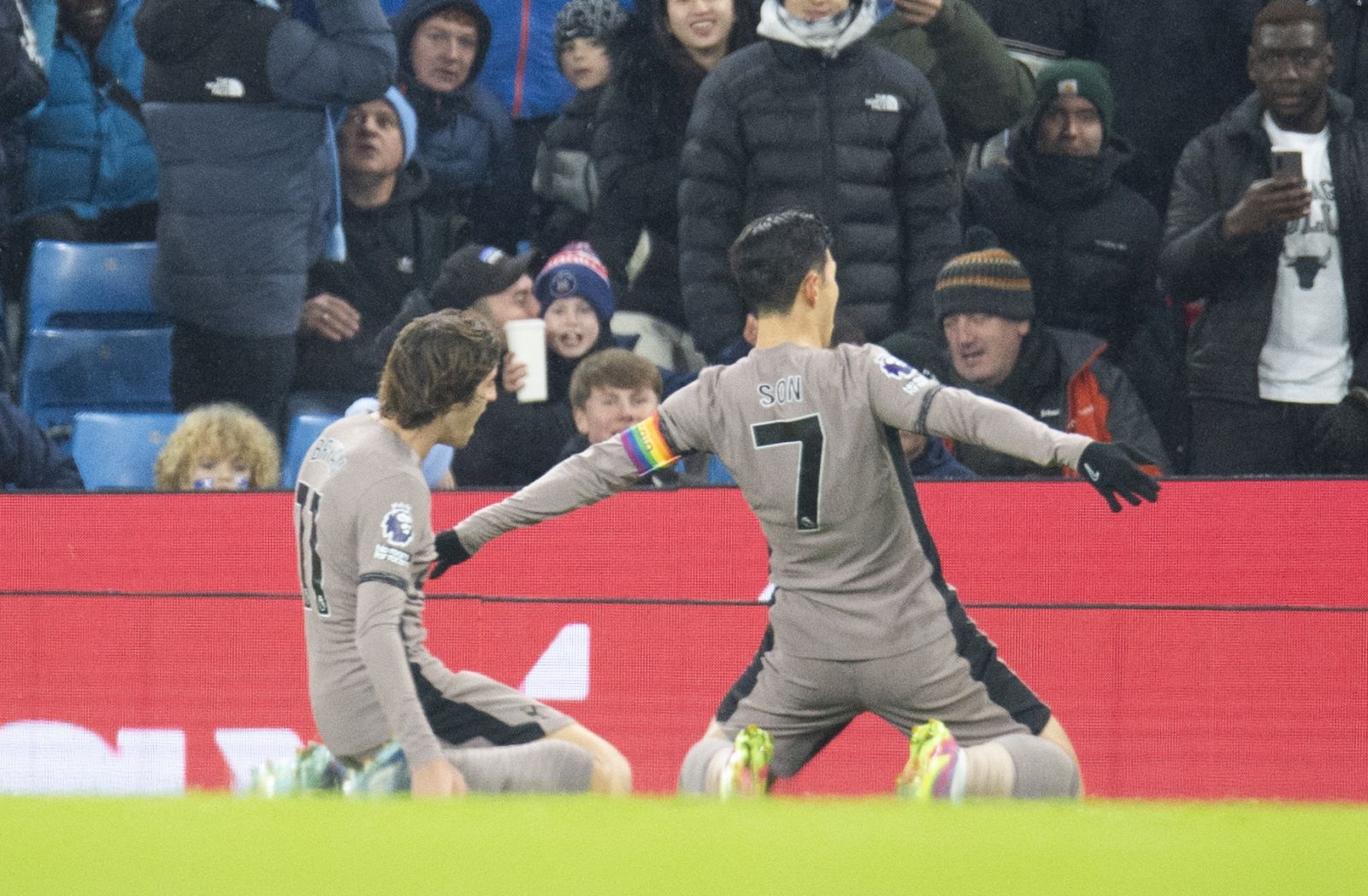 epa11009442 Son Heung-Min (R) of Tottenham Hotspur celebrates after scoring the opening goal during the English Premier League soccer match between Manchester City and Tottenham Hotspur, in Manchester, Britian, 03 December 2023.  EPA/PETER POWELL EDITORIAL USE ONLY. No use with unauthorized audio, video, data, fixture lists, club/league logos, 'live' services or NFTs. Online in-match use limited to 120 images, no video emulation. No use in betting, games or single club/league/player publications.