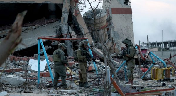 epa11018172 A photo taken while embedded with the Israel Defense Forces (IDF) shows Israeli soldiers at a position in the Palestinian town of Beit Lahia, on the outskirts of the city of Gaza, northern Gaza Strip, 08 December 2023. Israeli forces resumed military strikes on Gaza after a week-long truce expired on 01 December. More than 16,200 Palestinians and at least 1,200 Israelis have been killed, according to the Palestinian Health Ministry and the Israel Defense Forces (IDF), since Hamas militants launched an attack against Israel from the Gaza Strip on 07 October, and the Israeli operations in Gaza and the West Bank which followed it. The Israeli military stated that its forces are involved in 'ground operations' against Hamas in the Gaza Strip, including the south of the enclave.  EPA/ATEF SAFADI