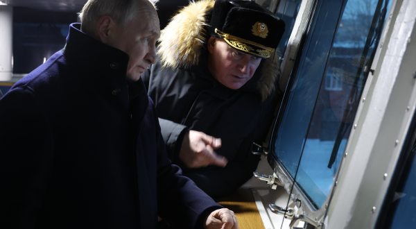 epa11023047 Russian President Vladimir Putin (L), accompanied by Commander-in-Chief of the Russian Navy Nikolai Yevmenov (R), visits the Russian Navy Northern Fleet's frigate Admiral Kasatonov at the Sevmash Shipyard, a subsidiary of the United Shipbuilding Corporation, in Severodvinsk, Arkhangelsk region, Russia, 11 December 2023. Vladimir Putin took part in the ceremony of commissioning two new nuclear submarines into the Navy - the multipurpose submarine 'Krasnoyarsk' and the strategic submarine 'Emperor Alexander III'. A series of fourth-generation nuclear submarines of the Borei and Borei-A projects, armed with Bulava intercontinental ballistic missiles, will become the basis of naval strategic nuclear forces for the coming decades, the Russian military said.  EPA/MIKHAEL KLIMENTYEV/SPUTNIK/KREMLIN POOL MANDATORY CREDIT