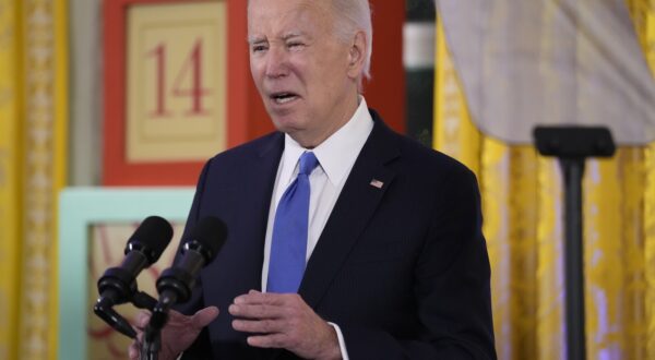 epa11023743 President Joe Biden speaks during a Hanukkah reception in the East Room of the White House in Washington, DC, USA, 11 December 2023.  EPA/Jacquelyn Martin / POOL 12345678