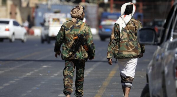 epa11024188 Houthi fighters walk through a street in Sana'a, Yemen, 12 December 2023. Yemen's Houthis claimed a missile attack against a Norwegian tanker off Yemen in the Red Sea, days after they pledged to target Israel-bound ships of any nationality, amid an escalation of their attacks and hijackings of commercial ships in the Red Sea in retaliation for Israel's airstrikes on the Gaza Strip. Thousands of Israelis and Palestinians have died since the militant group Hamas launched an unprecedented attack on Israel from the Gaza Strip on 07 October, and the Israeli strikes on the Palestinian enclave which followed it.  EPA/YAHYA ARHAB