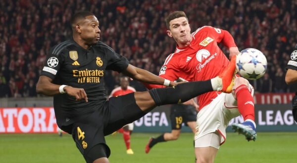 epa11025291 Madrid's David Alaba (L), Berlin's Robin Gosens (C) and Madrid's Lucas Vazquez (R) in action during the UEFA Champions League group stage match between Union Berlin and Real Madrid, in Berlin, Germany, 12 December 2023.  EPA/CLEMENS BILAN