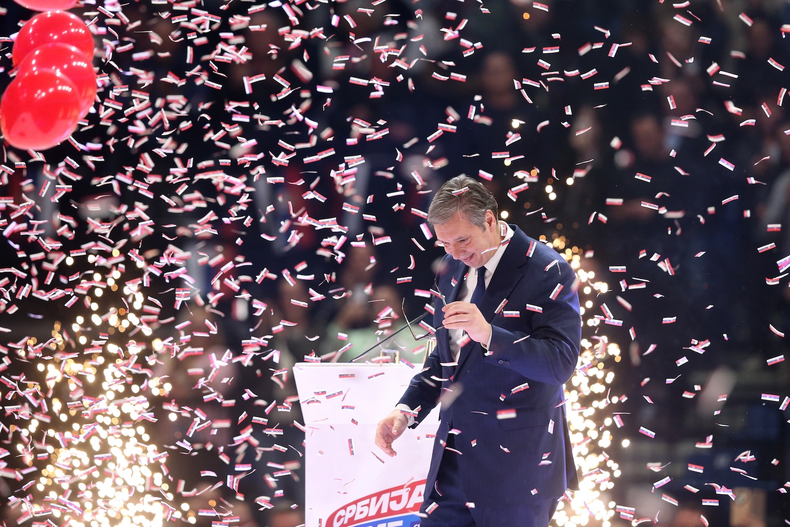 epa11008037 Serbian President Aleksandar Vucic is showered with confetti during the Serbian Progressive Party (SNS) pre-election campaign rally in Belgrade, Serbia, 02 December 2023. Voters in Serbia will elect a new parliament and local authorities in 64 municipalities on 17 December 2023.  EPA/ANDREJ CUKIC