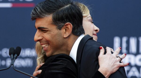 epa11032540 Italian Prime Minister Giorgia Meloni hugs British Prime Minister Rishi Sunak during the Atreju 2023 political festival in the gardens of Castel Sant'Angelo in Rome, Italy, 16 December 2023. The Atreju political festival in Rome was organized by Italian Prime Minister Meloni and her right-wing party, Brothers of Italy. The theme of this year's edition is 'Welcome Back Italian Pride' (Bentornato orgoglio italiano).  EPA/ANGELO CARCONI