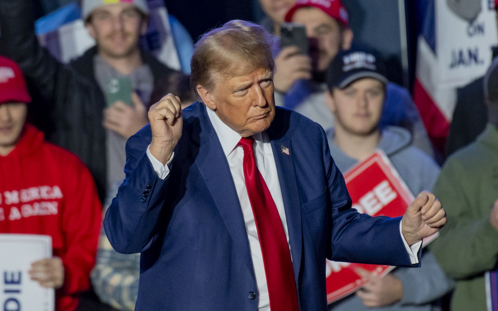 epa11033211 Republican candidate for President Former US President Donald Trump, dances for the crowd of supporters after his address during a rally at the University of New Hampshire in Durham, New Hampshire, USA, 16 December 2023. The New Hampshire Republican primary will take place on 23 January 2024.  EPA/AMANDA SABGA
