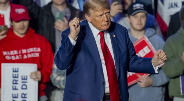 epa11033211 Republican candidate for President Former US President Donald Trump, dances for the crowd of supporters after his address during a rally at the University of New Hampshire in Durham, New Hampshire, USA, 16 December 2023. The New Hampshire Republican primary will take place on 23 January 2024.  EPA/AMANDA SABGA