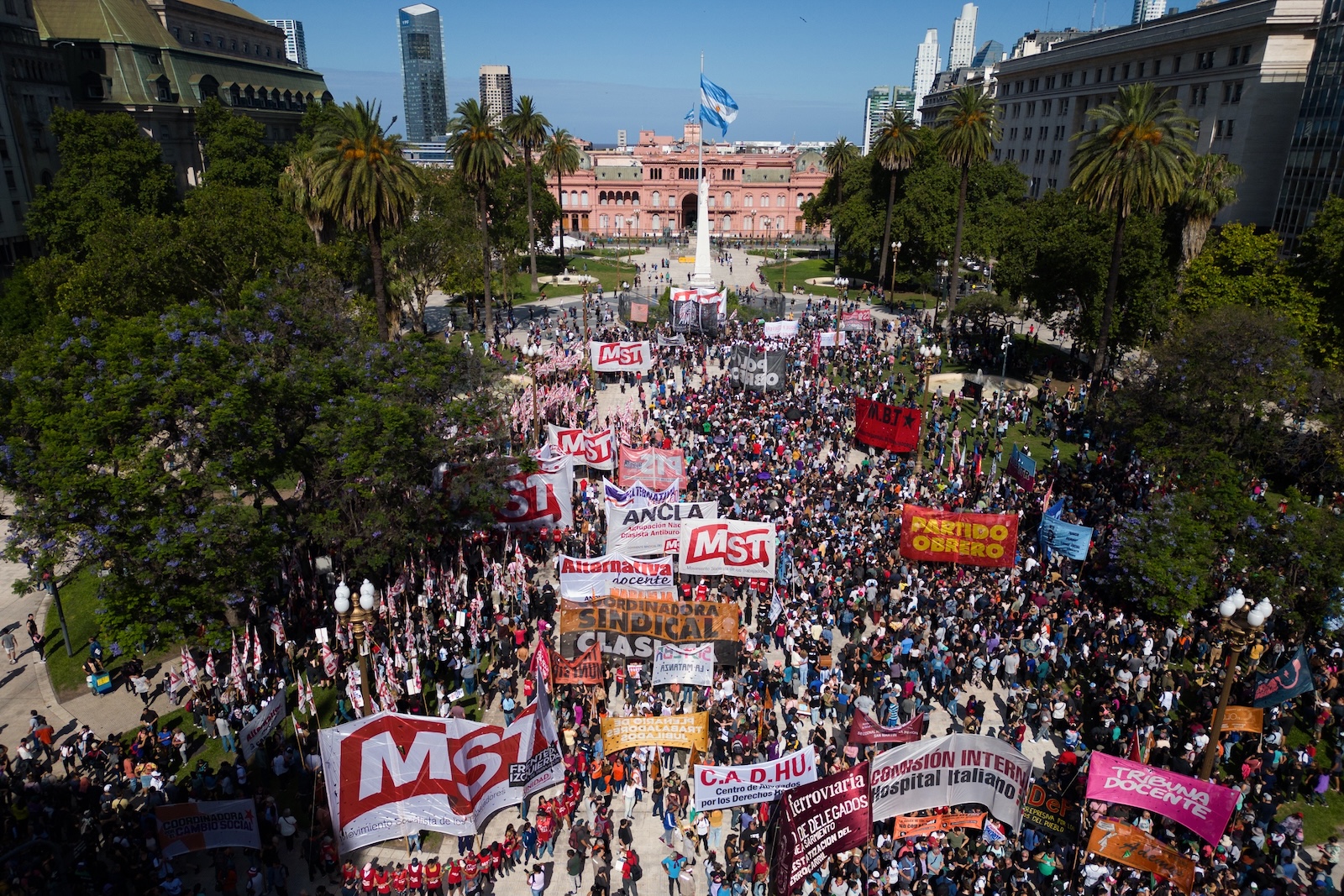epa11039229 An image taken with a drone of citizens during a protest against the goverment of new Argentinian President Javier Milei near the Casa Rosada government building in Buenos Aires, Argentina, 20 December 2023. The day of mobilizations advanced in Argentina, with the government of Javier Milei monitoring the main access roads to Buenos Aires and the organizers of the protests changing the route of the large demonstration. Milei faced his first protests after assuming as president on 10 December 2023.  EPA/Isaac Fontana