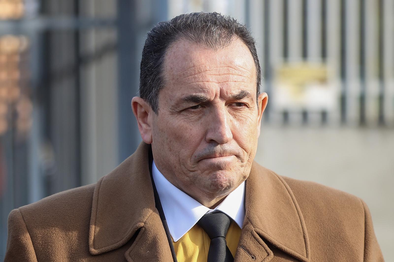 05.12.2023., Sarajevo, Bosna i Hercegovina - Bivsi ministar obrane BiH Selmo Cikotic odlazi sa suda nakon sto je prvostupanjskom presudom proglasen krivim te je osudjen na tri godine zatvora zbog zloupotrebe polozaja. Tereti ga se da je od 2009. do 2011. godine iskoristio sluzbeni polozaj i pogodovao tvrtki "Scout" iz Zagreba, koja je trebala otkupiti viskove naoruzanja iz BiH, cime je ostetio drzavni proracun za 9,7 miliona KM. Photo: Armin Durgut/PIXSELL