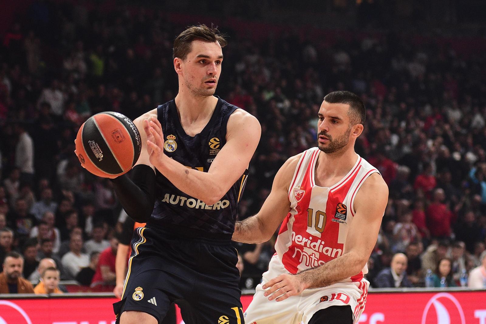 19, December, 2023, Belgrade - The match of the 15th round of the Turkish Airlines Euroleague between KK Crvena zvezda Meridianbet Belgrade and KK Real Madrid was played in Stark Arena. Mario Hezonja, #11 (BC Real Madrid), Branko Lazic, #10 (KK Crvena zvezda MeridianBet). Photo: Dusan Milenkovic/ATAImages

19, decembar, 2023, Beograd - Utakmica 15. kola Turkish Airlines Evrolige izmedju KK Crvena zvezda Meridianbet Belgrade i KK Real Madrid odigrana je u Stark areni. Photo: Dusan Milenkovic/ATAImages Photo: Dusan Milenkovic/ATAImages/PIXSELL