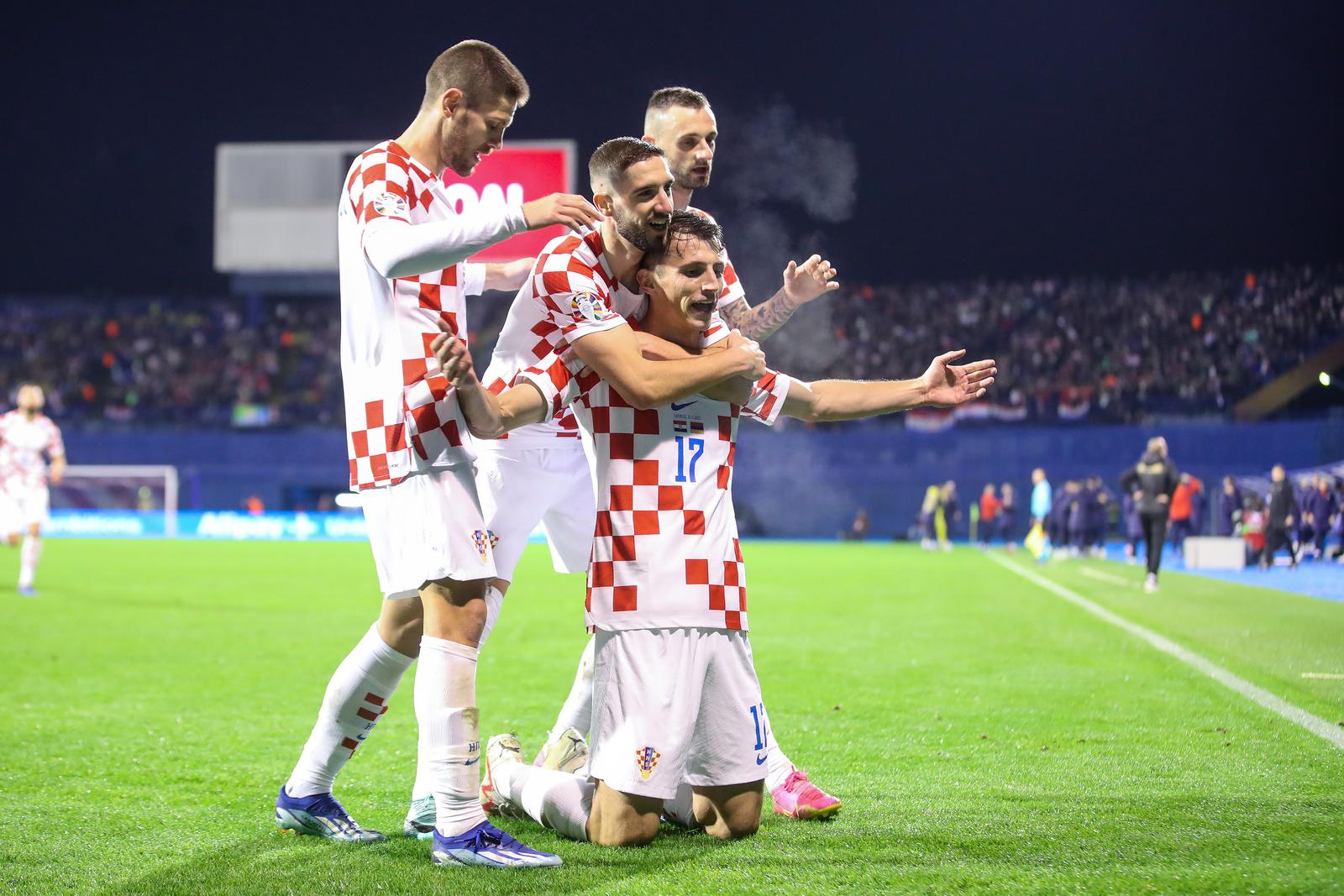 21.11.2023.,  stadion Maksimir, Zagreb - Kvalifikacije za UEFA Euro 2024, skupina D, Hrvatska - Armenija. Nogometasi Hrvatske slave pogodak Ante Budimira za vodstvo 1:0. Andrej Kramaric, Luka Ivanusec, Ante Budimir Photo: Luka Stanzl/PIXSELL