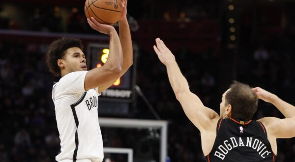 Dec 26, 2023; Detroit, Michigan, USA; Brooklyn Nets forward Cameron Johnson (2) puts up a shot over Detroit Pistons forward Bojan Bogdanovic (44) in the second half at Little Caesars Arena. Mandatory Credit: Rick Osentoski-USA TODAY Sports Photo: Rick Osentoski/REUTERS