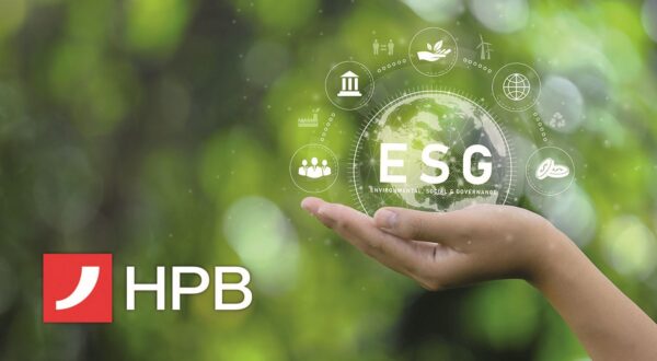 ESG icon concept. Environment in renewable hands. Nature, earth, society and governance SG in sustainable business on networked connections on green background. environmental icon