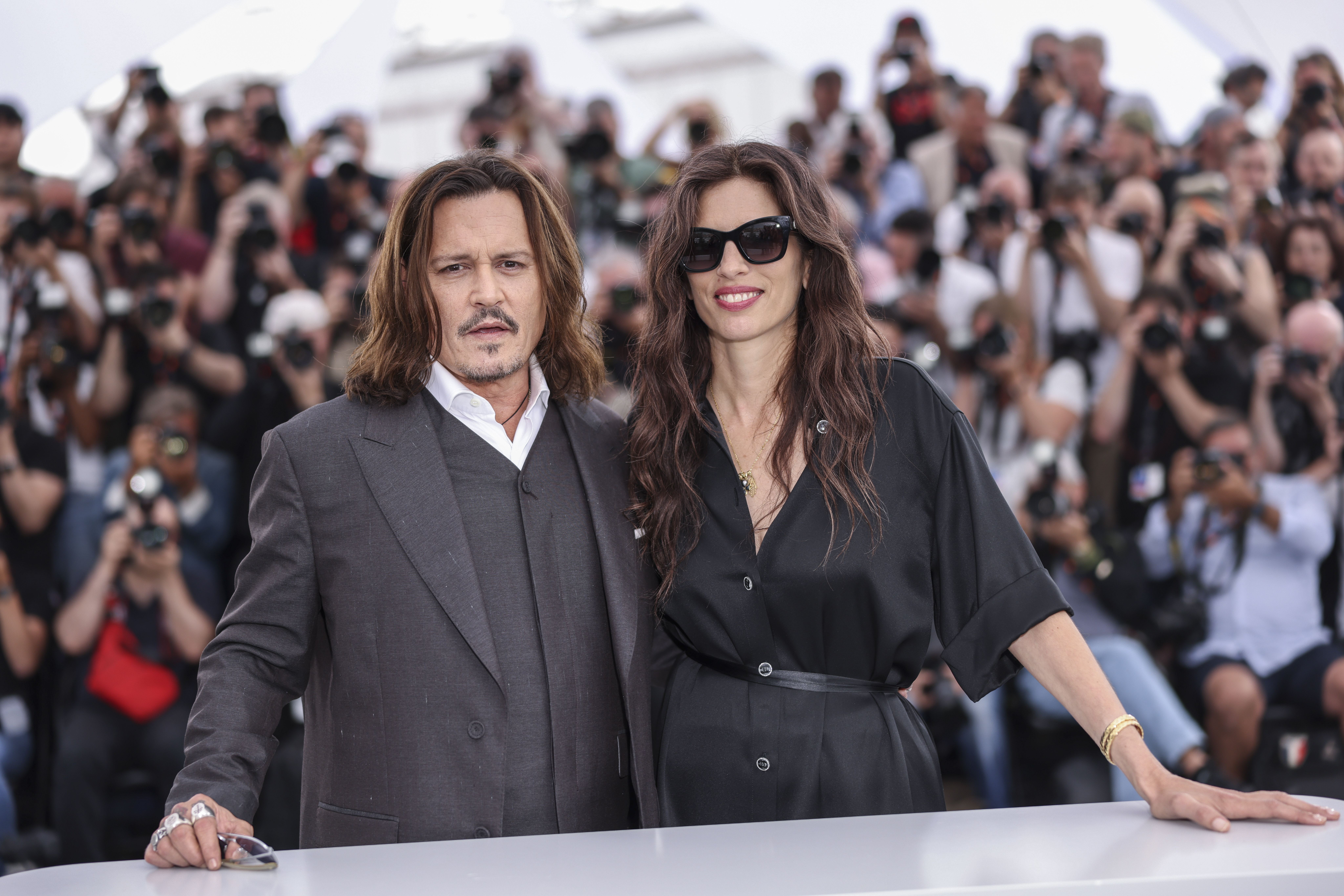 Johnny Depp, left, and director Maiwenn pose for photographers at the photo call for the film 'Jeanne du Barry' at the 76th international film festival, Cannes, southern France, Wednesday, May 17, 2023. (Photo by Vianney Le Caer/Invision/AP)