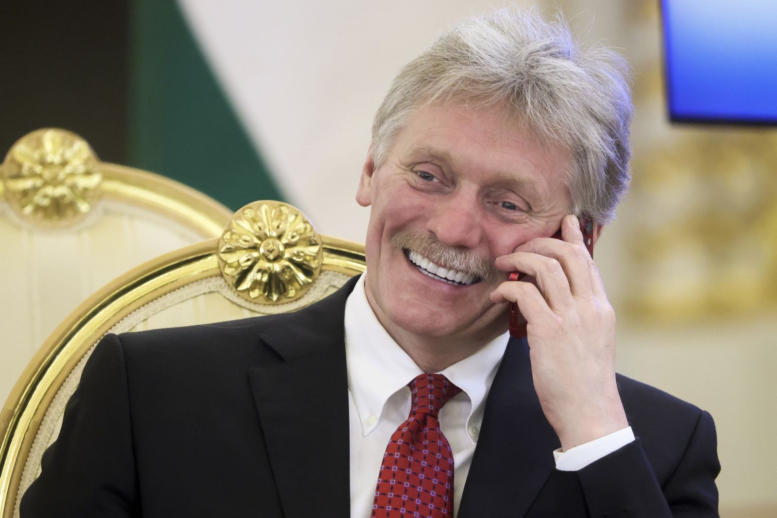 Kremlin spokesman Dmitry Peskov speaks on the phone as he attends a meeting of the Supreme Eurasian Economic Council at the Kremlin in Moscow, Russia, Thursday, May 25, 2023. (Mikhail Metzel, Sputnik, Kremlin Pool Photo via AP)