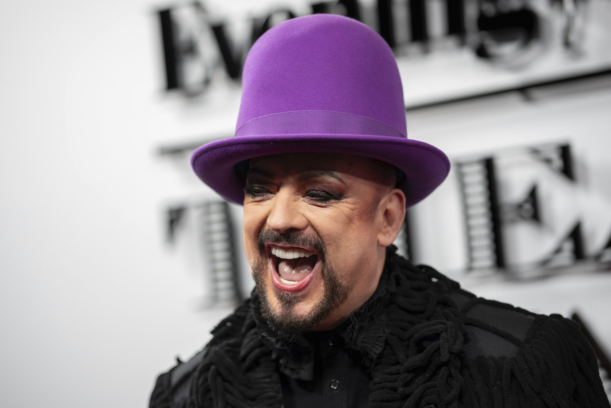 Boy George poses for photographers upon arrival at The Evening Standard Theatre Awards in London, Sunday, Nov. 19, 2023. (Photo by Scott Garfitt/Invision/AP)