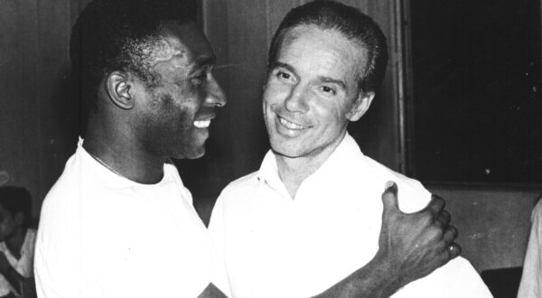FILE - Brazil's soccer star Pele, left, embraces Mario Zagallo after the latter's appointment as coach of the Brazilian national soccer team, in Rio De Janeiro, Brazil, in March 1970. Zagallo, who reached the World Cup final a record five times, winning four, as a player and then a coach with Brazil, has died. He was 92. Brazilian soccer confederation president Ednaldo Rodrigues said in a statement in the early hours of Saturday, Jan. 5, 2024, confirming Zagallo's death that Zagallo "is one of the biggest legends" of the sport. (AP Photo, File)