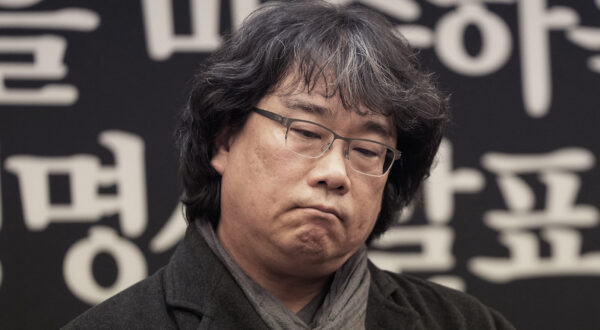 South Korean director Bong Joon-ho reacts during a press conference demanding an investigation into the case for the death of the late actor Lee Sun-kyun in Seoul, South Korea, Friday, Jan. 12, 2024. Lee, a popular South Korean actor best known for his role in the Oscar-winning movie "Parasite," was found dead in a car in Seoul on Dec. 27, 2023, authorities said, after weeks of an intense police investigation into his alleged drug use. (AP Photo/Ahn Young-joon)
