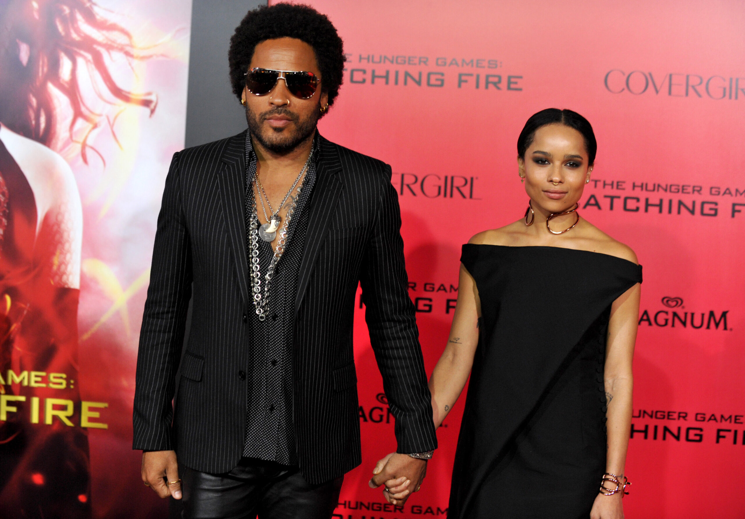 Lenny Kravitz, left, and Zoe Kravitz arrive at the Los Angeles premiere of "The Hunger Games: Catching Fire"  at Nokia Theatre LA Live on Monday, Nov. 18, 2013. (Photo by Jordan Strauss/Invision/AP)