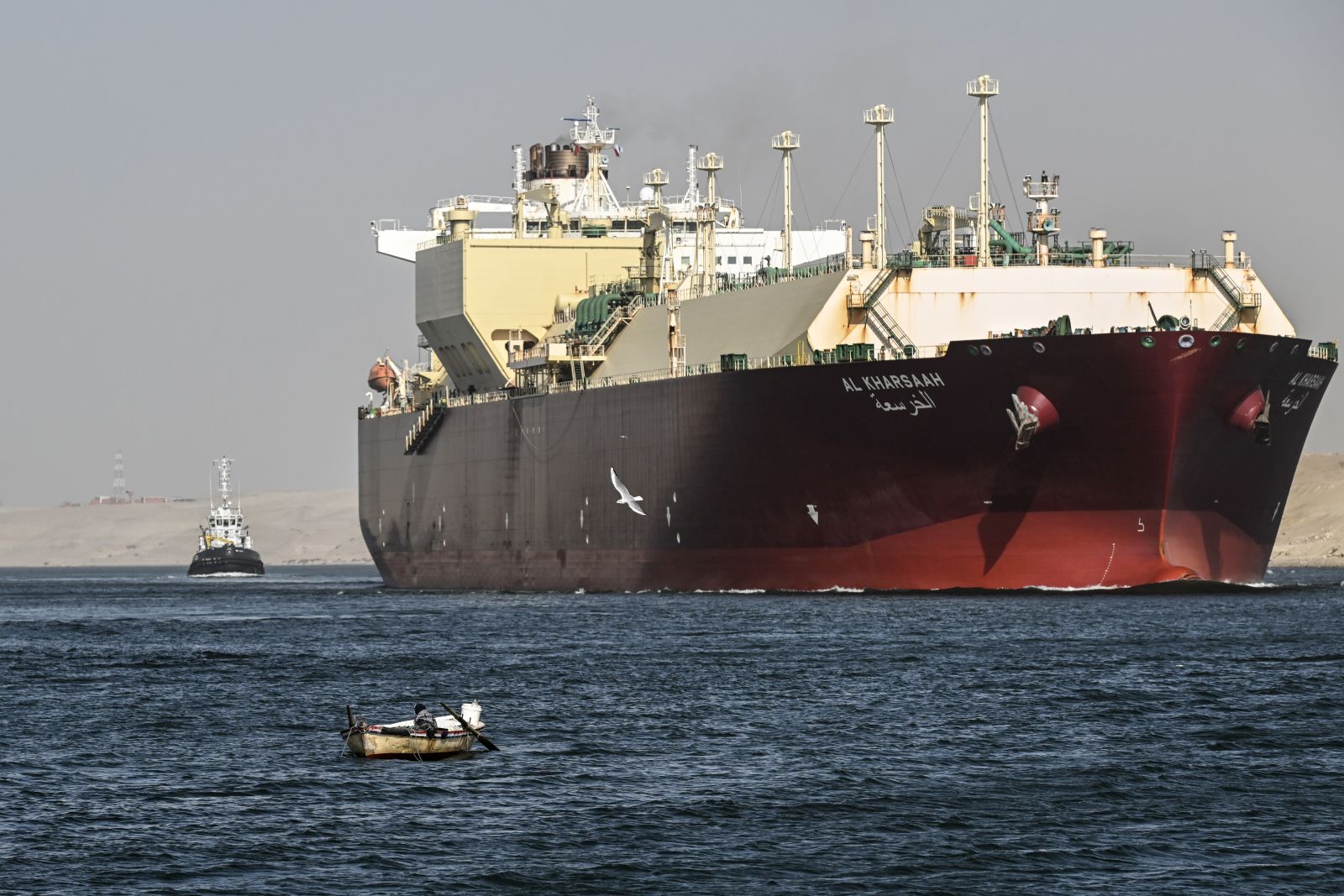 epa11040943 A ship crosses the Suez Canal towards the Red Sea in Ismailia, Egypt, 22 December 2023. On 18 December, the US Department of Defense announced a multinational operation to safeguard trade and to protect ships in the Red Sea, amid the recent escalation in Houthi attacks originating from Yemen, according to a press release from the U.S. Department of Defense. These attacks in recent weeks had prompted major shipping companies to reroute their operations and raised concerns of prolonged disruptions to global trade.  EPA/MOHAMED HOSSAM
