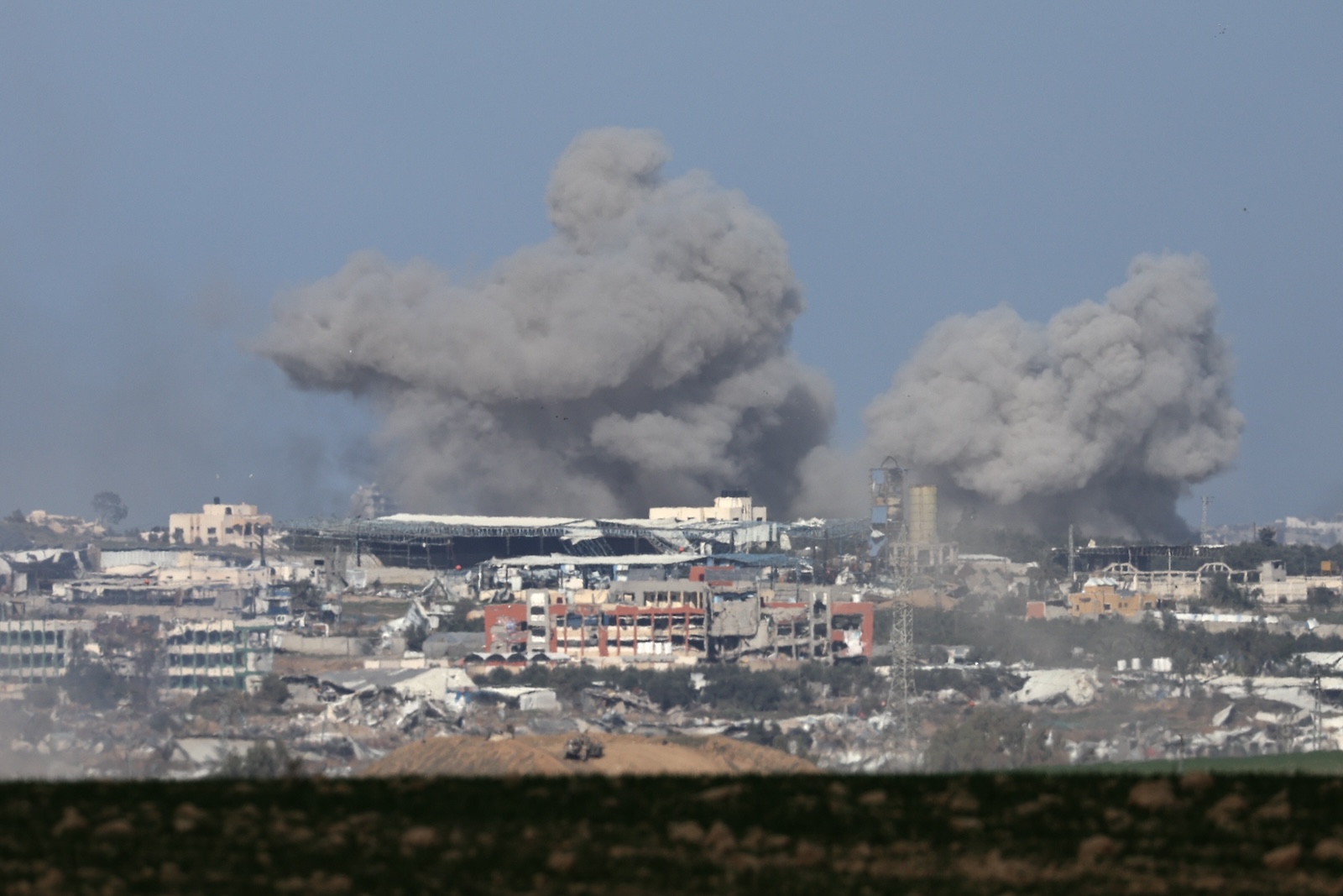 epa11047843 Smoke rises from the Shujaiya neighborhood in the Gaza Strip, following Israeli airstrikes, as seen from a position near the Israeli-Gaza border, in southern Israel, 29 December 2023. More than 20,900 Palestinians and at least 1,300 Israelis have been killed, according to the Palestinian Health Ministry and the Israel Defense Forces (IDF), since Hamas militants launched an attack against Israel from the Gaza Strip on 07 October, and the Israeli operations in Gaza and the West Bank which followed it. The Israeli military stated that its ground, air, and naval troops are 'continuing to strike' targets in the Gaza Strip.  EPA/ATEF SAFADI