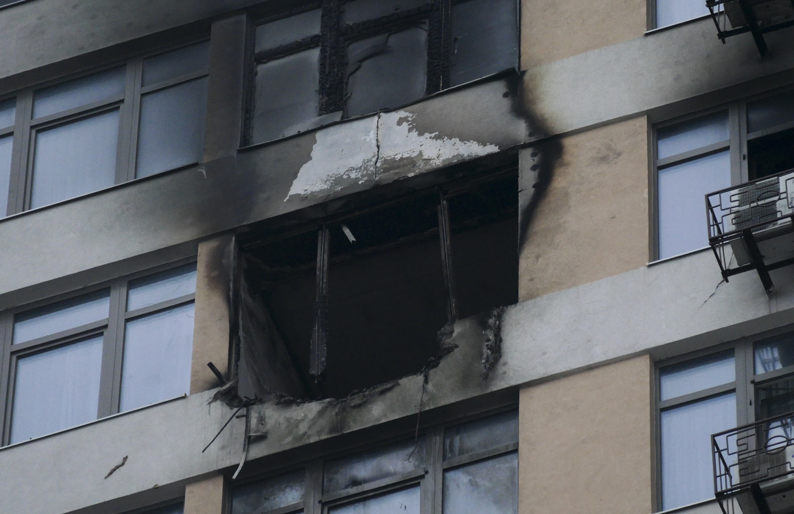 epa11052083 Damaged windows in a residential building after a drone attack in Odesa, southwestern Ukraine, 01 January 2024, amid the Russian invasion. At least one person died and three others were injured during an overnight attack in the Odesa region, the head of the Odesa Regional Military Administration Oleh Kiper wrote on telegram. The Ukrainian air force said they shot down 87 out of 90 'Shahed' drones in the overnight attack across several regions in Ukraine. Russian troops entered Ukraine in February 2022 starting a conflict that has provoked destruction and a humanitarian crisis.  EPA/IGOR TKACHENKO