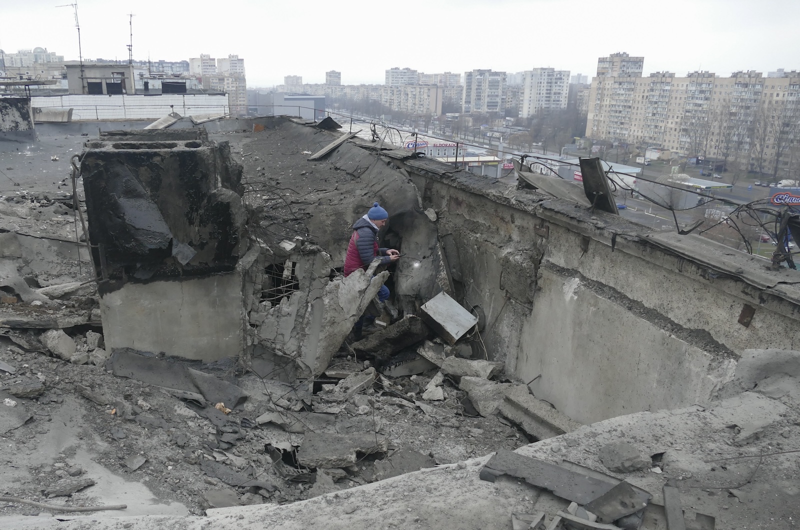 epa11052081 A local man inspects a damaged residential building after a drone attack in Odesa, southwestern Ukraine, 01 January 2024, amid the Russian invasion. At least one person died and three others were injured during an overnight attack in the Odesa region, the head of the Odesa Regional Military Administration Oleh Kiper wrote on telegram. The Ukrainian air force said they shot down 87 out of 90 'Shahed' drones in the overnight attack across several regions in Ukraine. Russian troops entered Ukraine in February 2022 starting a conflict that has provoked destruction and a humanitarian crisis.  EPA/IGOR TKACHENKO
