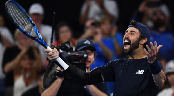 epa11058882 Jordan Thompson of Australia celebrates winning his quarter-final match against Rafael Nadal of Spain at the 2024 Brisbane International tennis tournament in Brisbane, Australia, 05 January 2024.  EPA/JONO SEARLE AUSTRALIA AND NEW ZEALAND OUT   EDITORIAL USE ONLY  EDITORIAL USE ONLY