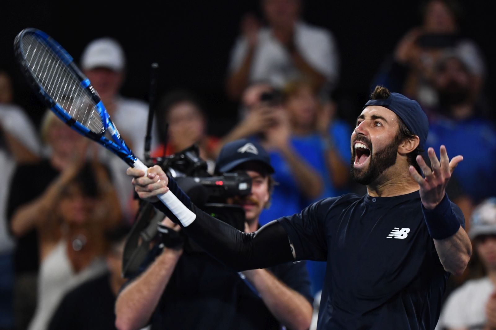 epa11058882 Jordan Thompson of Australia celebrates winning his quarter-final match against Rafael Nadal of Spain at the 2024 Brisbane International tennis tournament in Brisbane, Australia, 05 January 2024.  EPA/JONO SEARLE AUSTRALIA AND NEW ZEALAND OUT   EDITORIAL USE ONLY  EDITORIAL USE ONLY
