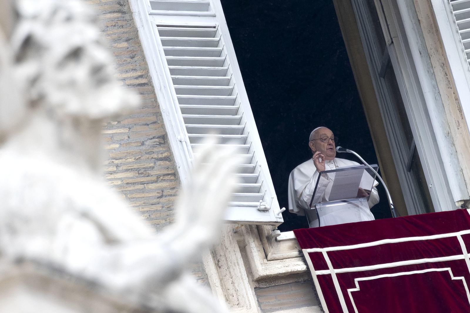 epa11062263 Pope Francis leads the Angelus prayer from the window of the Apostolic Palace overlooking Saint Peter's Square at the Vatican City, 07 January 2024.  EPA/MASSIMO PERCOSSI