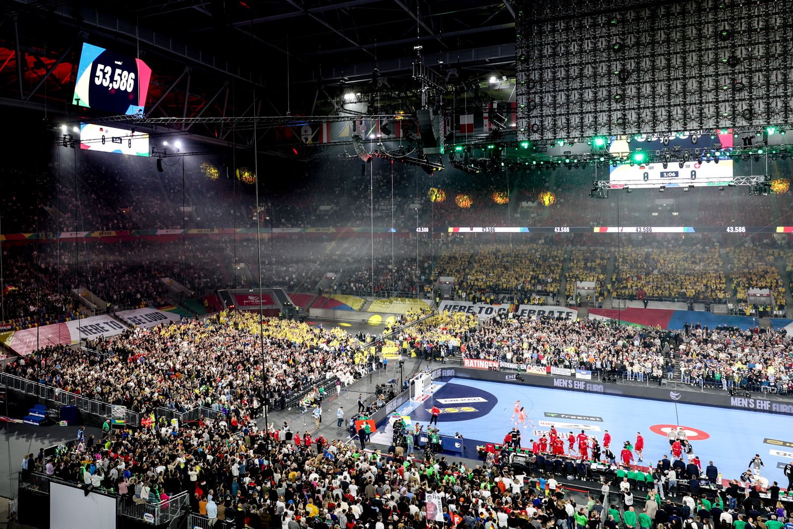 epa11068037 People attend the opening ceremony of the Men's EHF EURO 2024 Handball Championship in Duesseldorf, Germany, 10 January 2024.  EPA/Christopher Neundorf