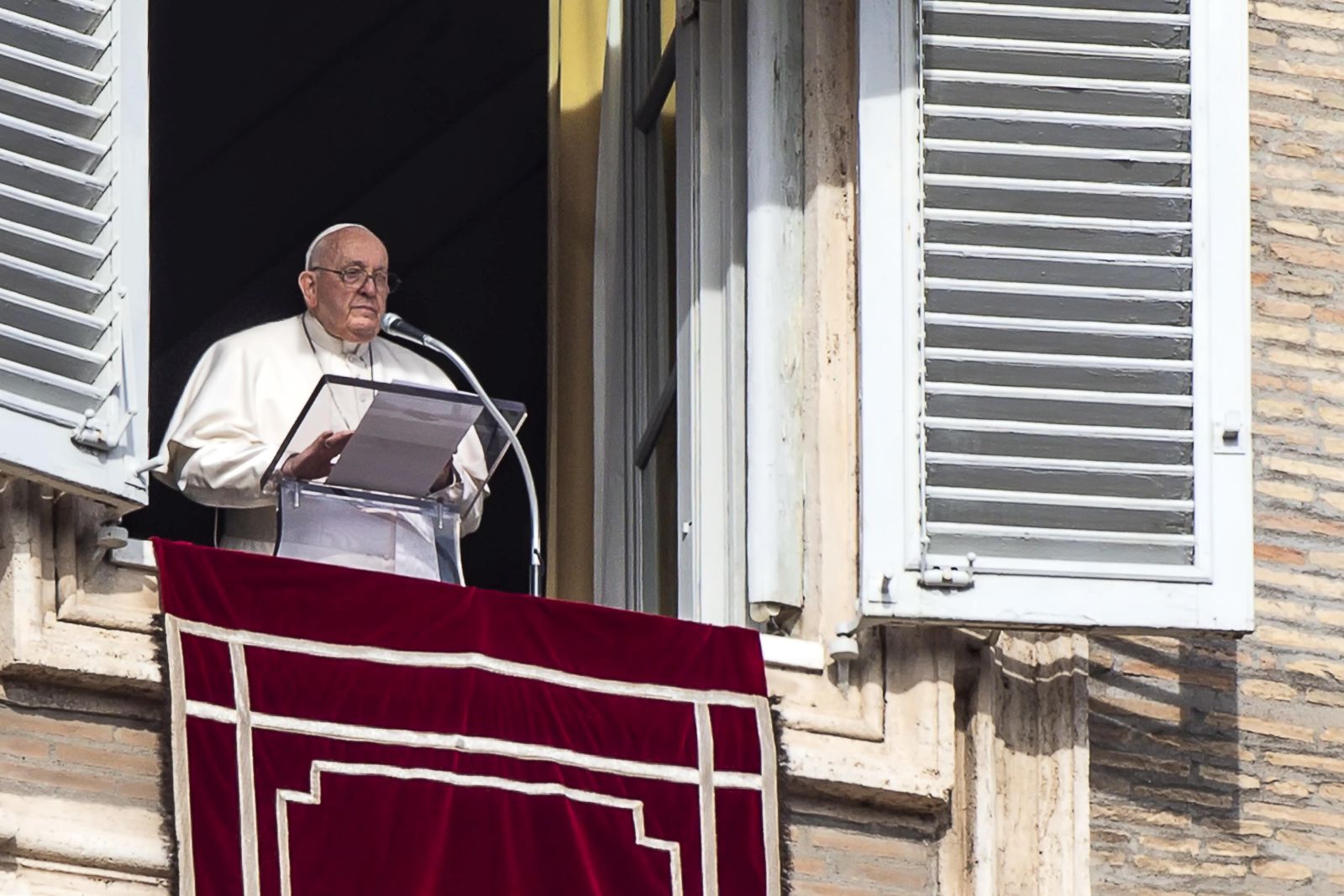 epa11075965 Pope Francis leads the Angelus prayer, traditional Sunday's prayer, from the window of his office overlooking Saint Peter's Square, Vatican City, 14 January 2024.  EPA/ANGELO CARCONI