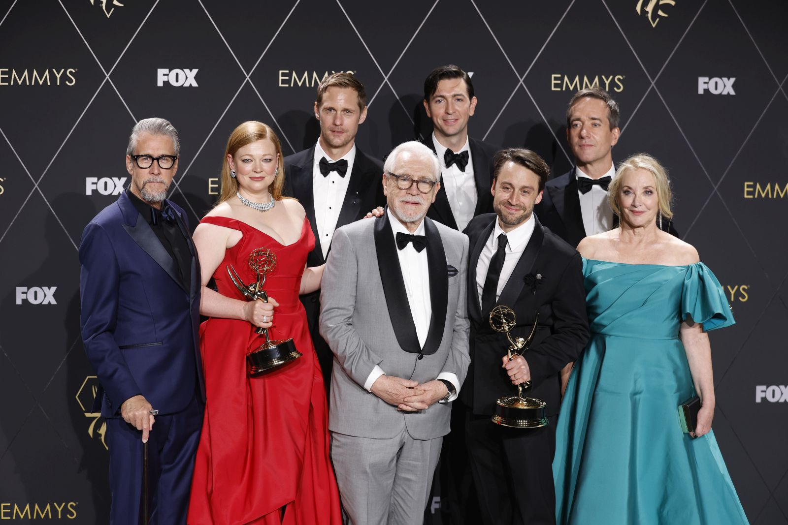 epa11081451 Cast members from 'Succesion' (L-R) Alan Ruck, Australian actor Sarah Snook, Swedish actor Alexander Skarsgard, Scottish actor Brian Cox, US actor Nicholas Braun, US actor Kieran Culkin, British actor Matthew Macfadyen and US actor J. Smith-Cameron pose in the press room during the 75th annual Primetime Emmy Awards ceremony held at the Peacock Theater in Los Angeles, California, USA, 15 January 2024. The Primetime Emmys celebrate excellence in national primetime television programming.  EPA/CAROLINE BREHMAN