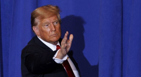 epa11083838 Republican candidate for president former US President Donald Trump waves as he leaves the stage following a rally in Atkinson, New Hampshire, USA, 16 January 2024.  This is Trump's first visit to New Hampshire following his win in the Iowa Caucus.  EPA/CJ GUNTHER
