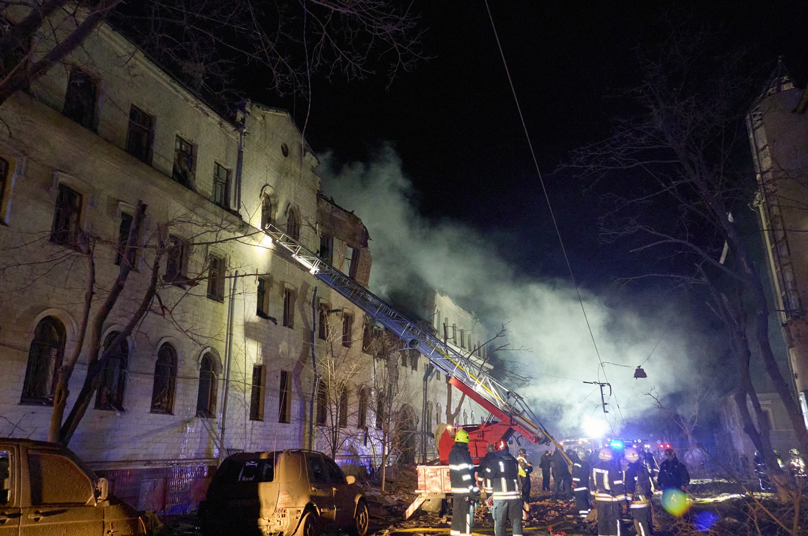epa11084526 Ukrainian rescuers work at the site of an overnight Russian rocket attack in Kharkiv, Ukraine, 16 January 2024(Issued 17 January). At least 17 people were injured as a result of two rockets hitting the downtown area of the eastern Ukrainian city of Kharkiv, according to the Mayor of Kharkiv, Ihor Terekhov. Russian troops entered Ukrainian territory in February 2022, starting a conflict that has provoked destruction and a humanitarian crisis.  EPA/YAKIV LIASHENKO