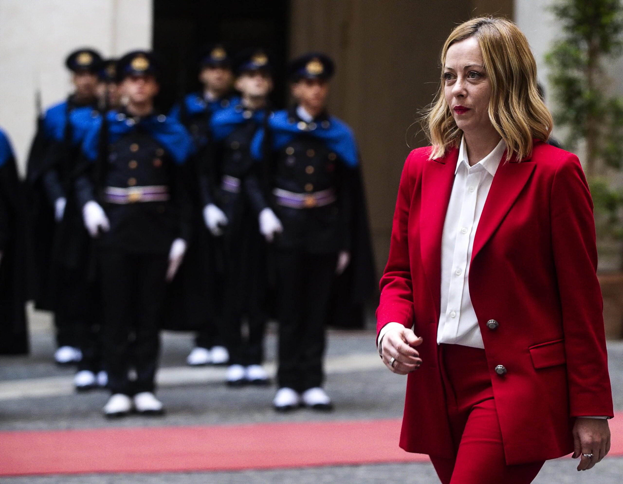 epa11087636 Italian Prime Minister Giorgia Meloni waits for the arrival of Kazakh President Kassym-Jomart Tokayev during a welcome ceremony prior to their meeting at Chigi Palace in Rome, Italy, 18 January 2024. The Kazakh president is on an official visit to Italy.  EPA/ANGELO CARCONI