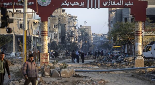 epa11090424 Destroyed houses and building in Al Maghazi refugee camp during Isreali military operation in southern Gaza Strip, 19 January 2024. More than 24,400 Palestinians and at least 1,300 Israelis have been killed, according to the Palestinian Health Ministry and the Israel Defense Forces (IDF), since Hamas militants launched an attack against Israel from the Gaza Strip on 07 October, and the Israeli operations in Gaza and the West Bank which followed it. Since 07 October, up to 1.9 million people, or more than 85 percent of the population, have been displaced throughout the Gaza Strip, some more than once, according to the United Nations Relief and Works Agency for Palestine Refugees in the Near East (UNRWA), which added that most civilians in Gaza are in 'desperate need of humanitarian assistance and protection.  EPA/MOHAMMED SABER