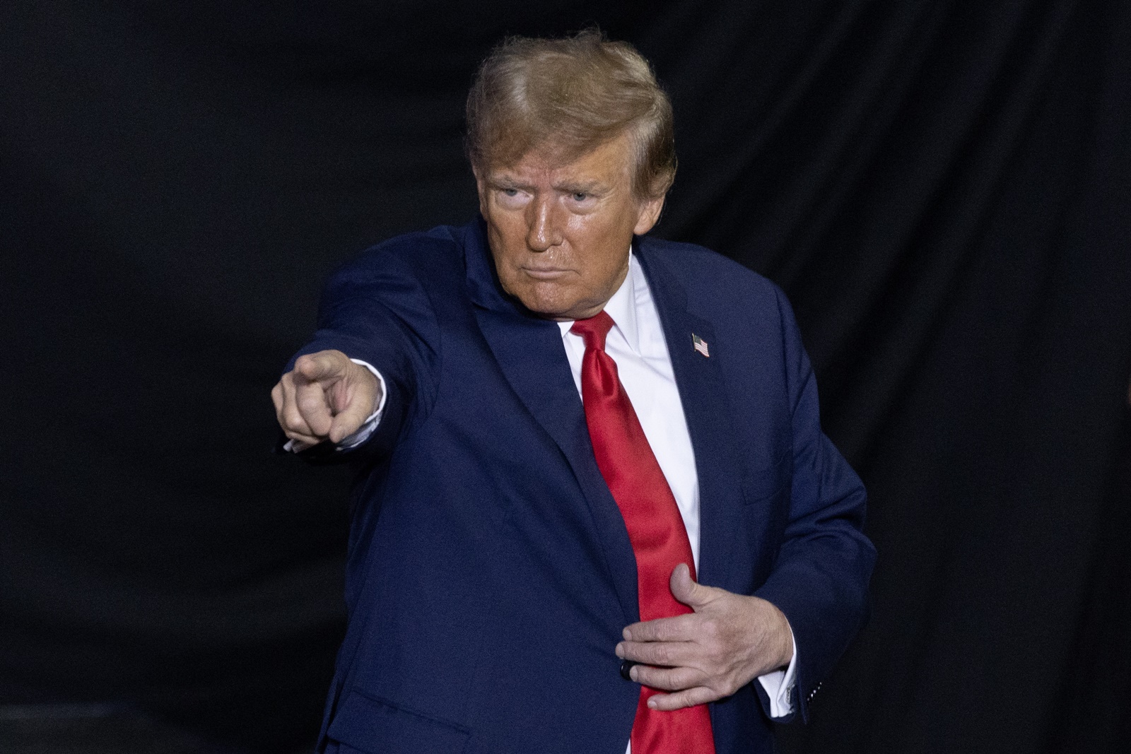 epa11093077 Former US President Donald J. Trump gestures as he concludes a campaign rally at SNHU Arena in Manchester, New Hampshire, USA, 20 January 2024. The New Hampshire primary is held on 23 January 2024 and is the second contest in the nominating process of the Republican presidential nomination.  EPA/MICHAEL REYNOLDS