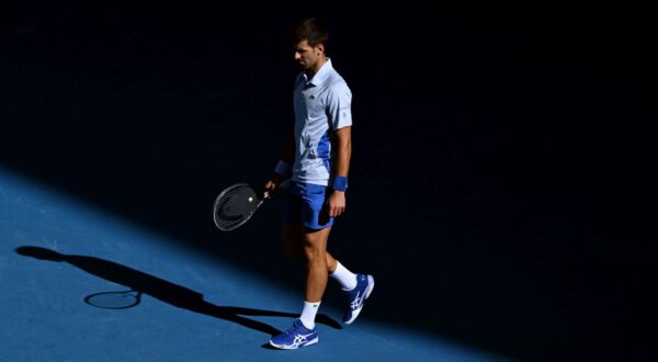 epa11104982 Novak Djokovic of Serbia reacts during his Men’s semifinal against Jannik Sinner of Italy on Day 13 of the 2024 Australian Open at Melbourne Park in Melbourne, Australia 26 January 2024.  EPA/JAMES ROSS AUSTRALIA AND NEW ZEALAND OUT