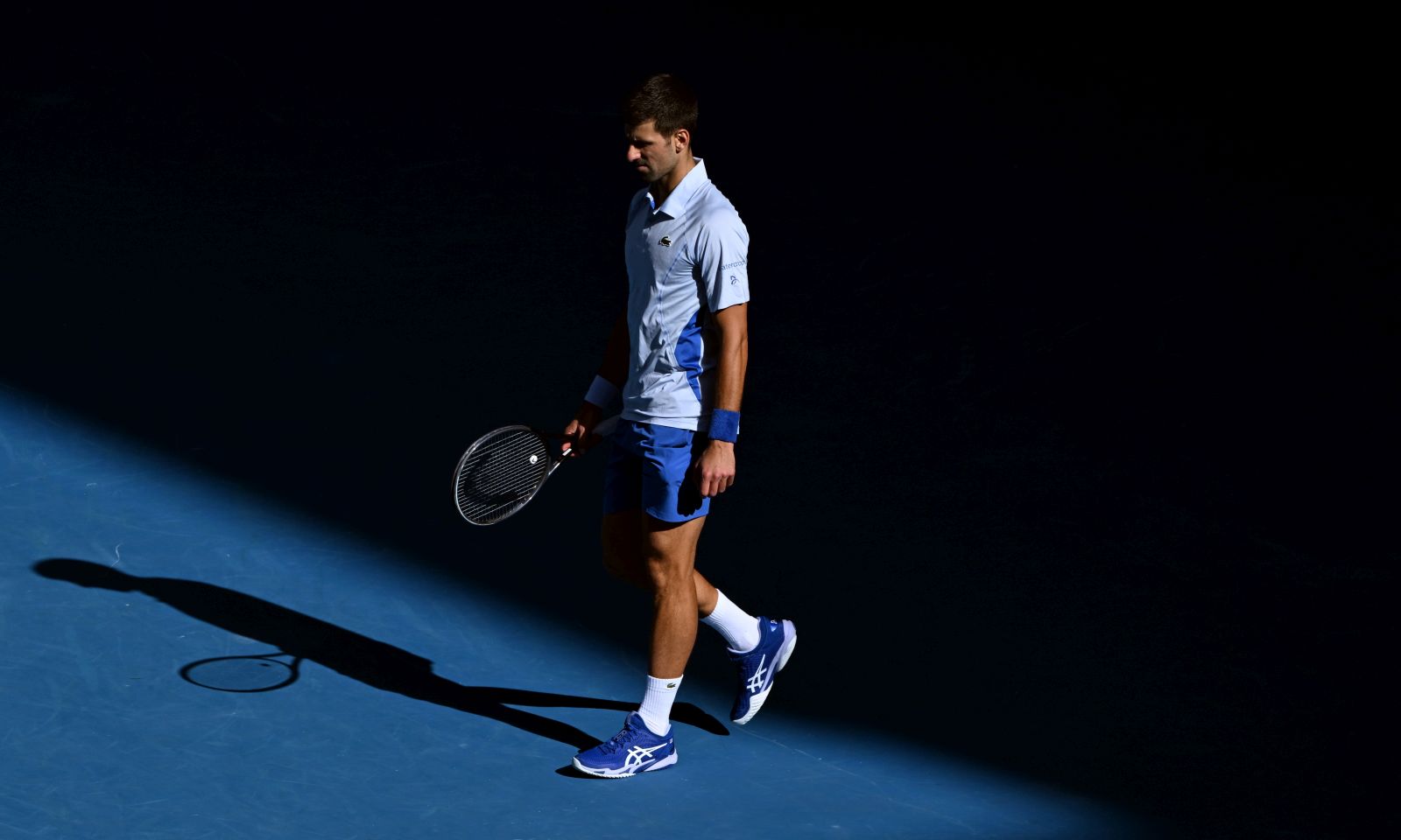 epa11104982 Novak Djokovic of Serbia reacts during his Men’s semifinal against Jannik Sinner of Italy on Day 13 of the 2024 Australian Open at Melbourne Park in Melbourne, Australia 26 January 2024.  EPA/JAMES ROSS AUSTRALIA AND NEW ZEALAND OUT