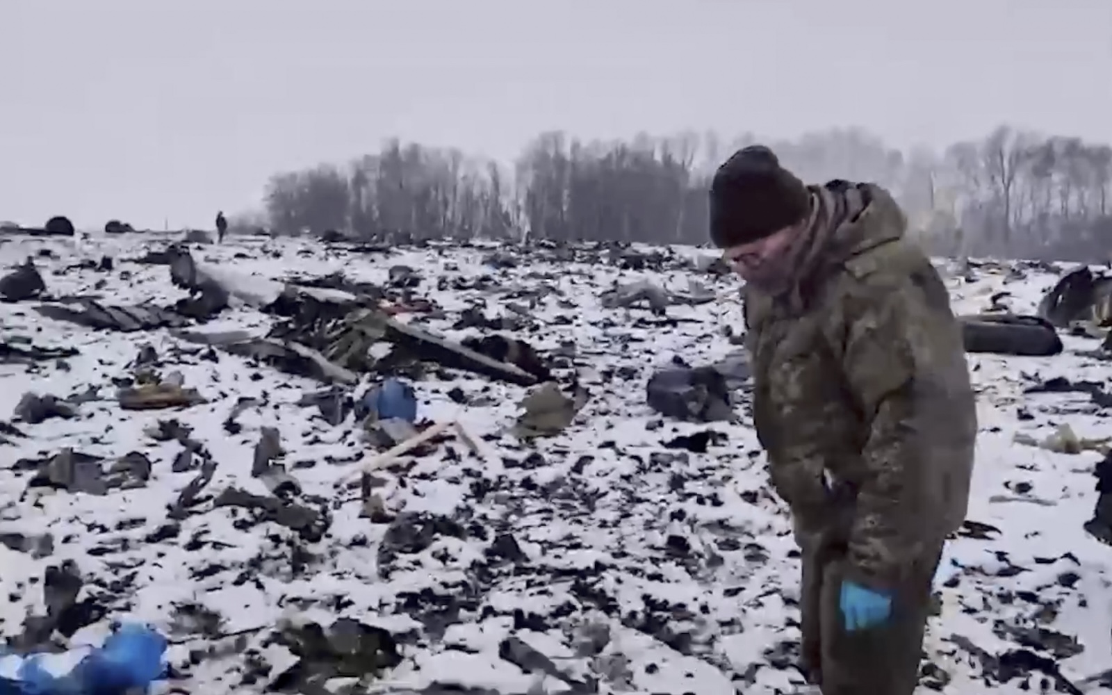 epa11106845 A still image taken from a handout video provided by the Russian Investigative Committee on 26 January 2024, shows what investigators say is the crash site of the Russian IL-76 military transport plane near the village of Yablonovo, Belgorod region, Russia. An Ilyushin Il-76 airlifter crashed on 24 January 2024 near the border with Ukraine. The Russian government is accusing Ukraine of shooting down the Il-76 aircraft and is claiming the plane was carrying 65 Ukrainian prisoners of war.  EPA/RUSSIAN INVESTIGATIVE COMMITEE HANDOUT   HANDOUT EDITORIAL USE ONLY/NO SALES HANDOUT EDITORIAL USE ONLY/NO SALES
