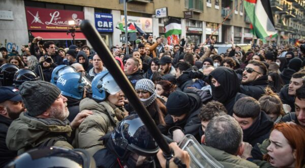 epa11108747 Pro-Palestinian demonstrators who wanted to leave in a procession came into contact with policemen in riot gear trying to break through their blockade, in Milan, Italy, 27 January 2024. Thousands of Israelis and Palestinians have been killed since the militant group Hamas launched an unprecedented attack on Israel from the Gaza Strip on 07 October 2023, and the Israeli strikes on the Palestinian enclave which followed it.  EPA/MATTEO CORNER