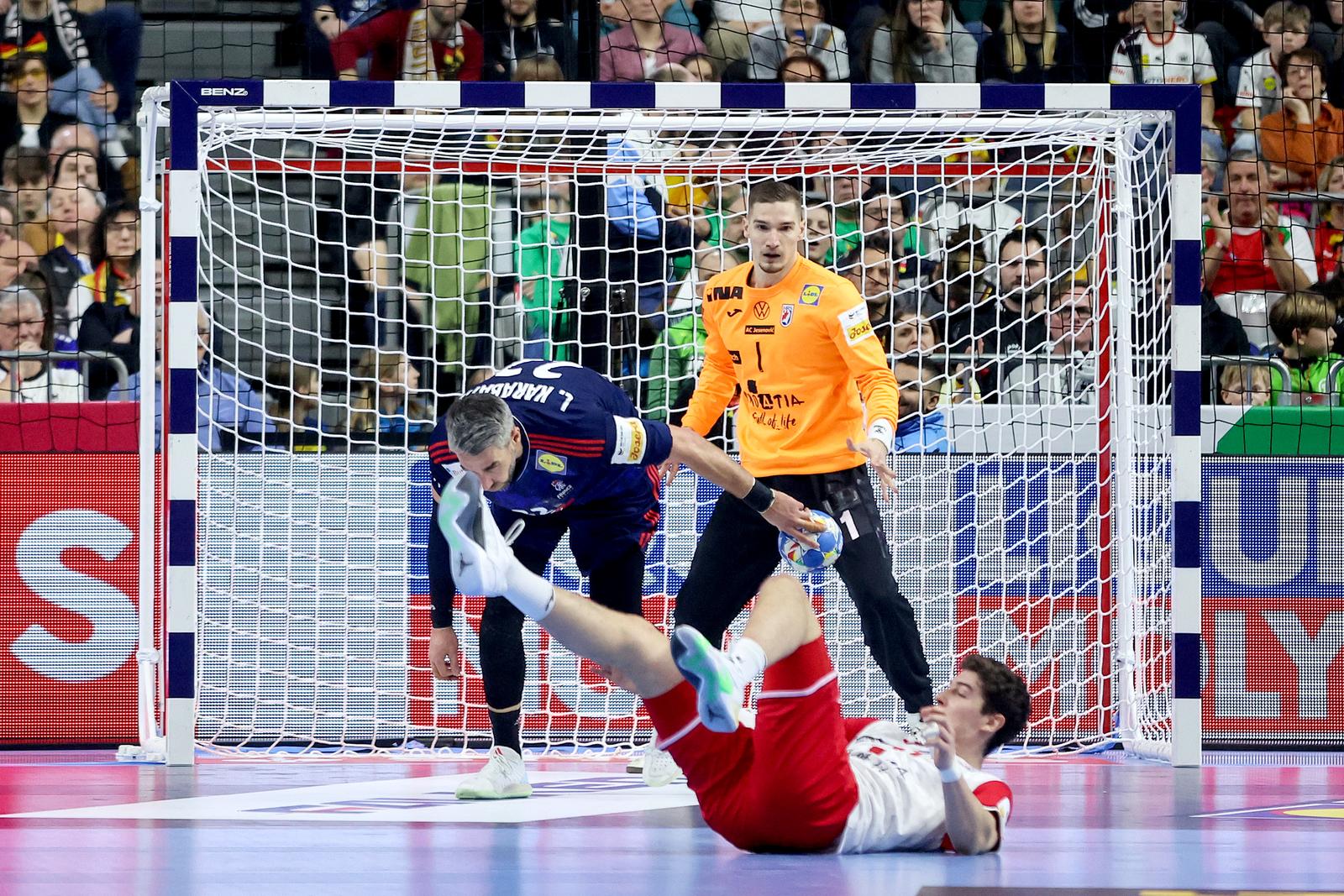 18.01.2024., Njemacka, Koeln - EHF Europsko prvenstvo u rukometu 2024. u Njemackoj. Drugi krug, Francuska - Hrvatska. Dominik Kuzmanovic. Photo: Sanjin Strukic/PIXSELL