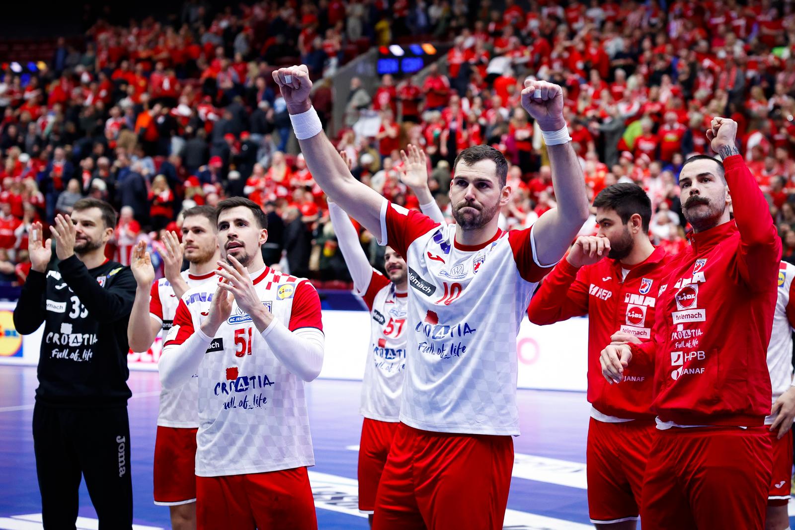 19.01.2023., Malmo Arena, Malmo, Svedska - IHF Svjetsko prvenstvo u rukometu, skupina IV, 3. kolo, Danska - Hrvatska. Ivan Martinovic, Jakov Gojun, Leon Susnja Photo: Pixsell/PIXSELL