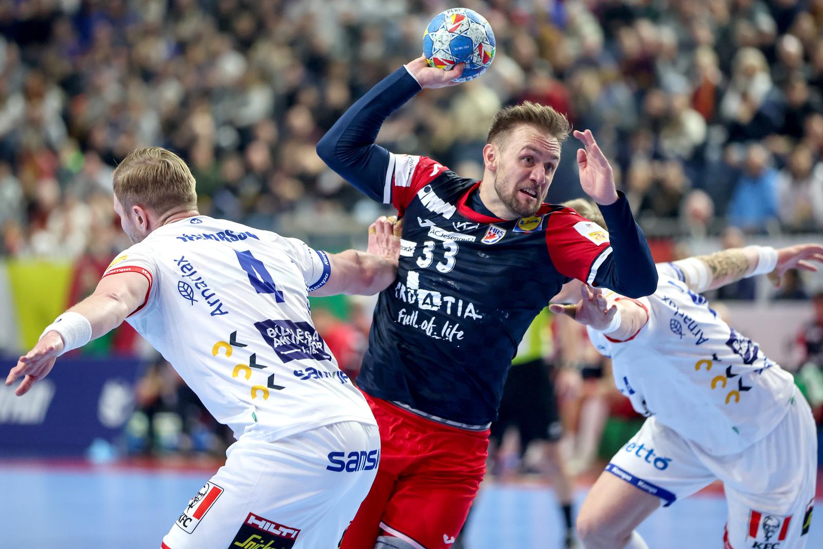 22.01.2024., Lanxess Arena, Koeln, Njemacka - EHF Europsko prvenstvo u rukometu 2024. u Njemackoj. Drugi krug, skupina 1, Hrvatska - Island. Luka Cindric Photo: Sanjin Strukic/PIXSELL