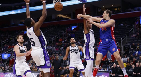 Jan 9, 2024; Detroit, Michigan, USA;  Detroit Pistons forward Bojan Bogdanovic (44) passes on on Sacramento Kings guard De'Aaron Fox (5) in the second half at Little Caesars Arena. Mandatory Credit: Rick Osentoski-USA TODAY Sports Photo: Rick Osentoski/REUTERS